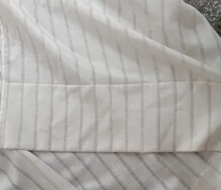 Quattro tende bianche plissettate triple