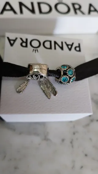 2 charms Pandora Atrapasueños y Circonitas.