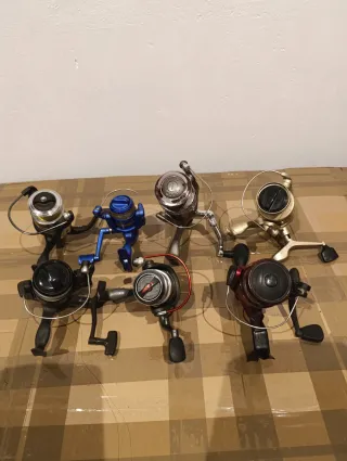 Lotto di 7 Mulinelli da Pesca di Diverse Marche