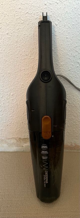 Aspirador escoba negro y naranja