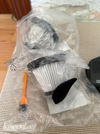 Aspirador escoba negro y naranja