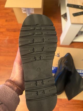 Botas altas negras con suela track