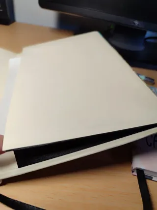 Libretas y bolígrafo con frases inspiradoras