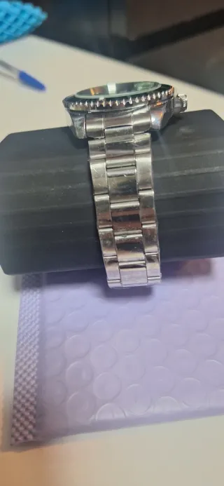 Orologio di lusso verde e argento