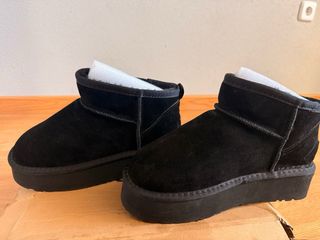 Botas UGG negras con pelo plataforma