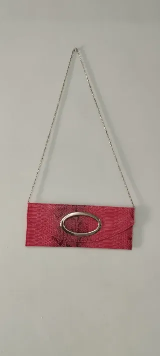 Bolso de mano clutch fucsia