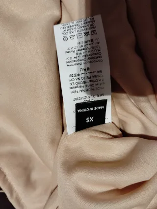 Falda corta lentejuelas doradas