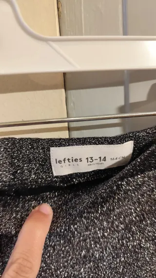 Leggings brillantes plateados y negros