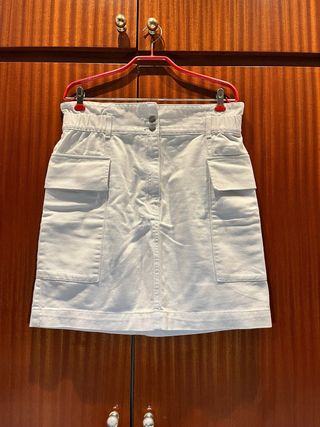 Falda tejana color crudo tejido grueso.