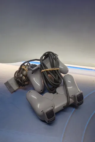 2 Mandos PlayStation grises para piezas