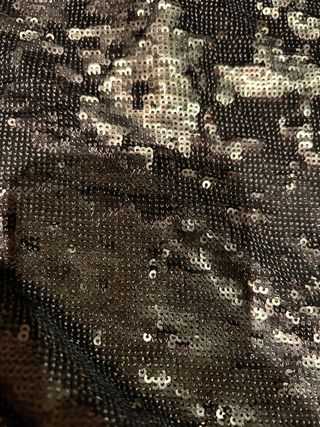 Top lentejuelas Massimo Dutti negro y dorado