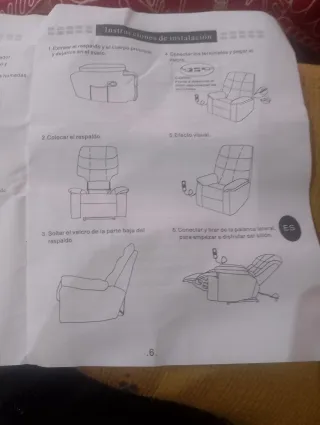 Butaca de piel blanca reclinable y com masajeador