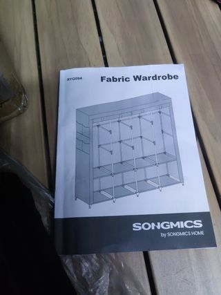 SONGMICS Armario, 4 Barras de Ropa, Estantes, 4 Bolsillos Laterales, Almacenamiento, de Tela, Perchero, Plegable, 45 x 170 x 167 cm, Negro Tinta RYG094B02