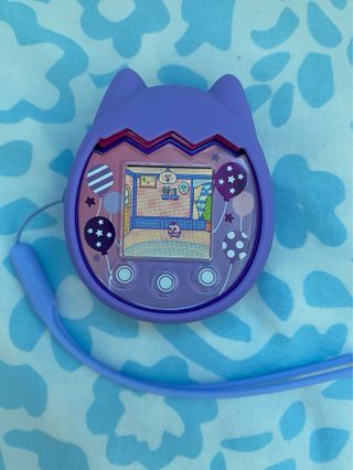 Tamagotchi Pix Party Morado + Funda y correa