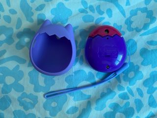 Tamagotchi Pix Party Morado + Funda y correa