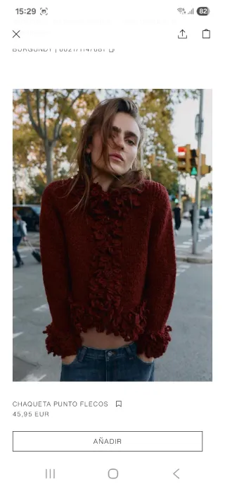 Chaqueta punto flecos granate