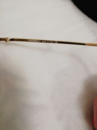 Gafas de sol Chanel doradas y naranjas