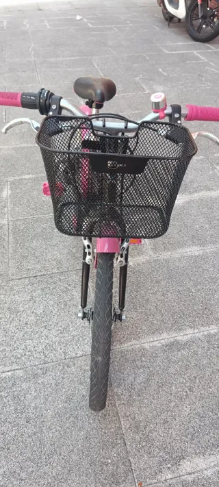 Bicicleta infantil Btwin 20 rosa y negra