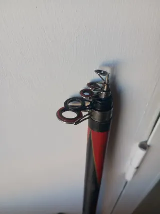 Caña de Carbono Surfcasting con Carrete