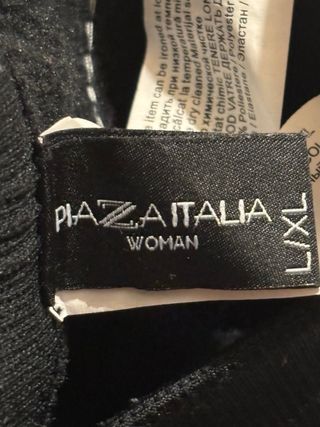 Pantaloni neri aderenti con strisce