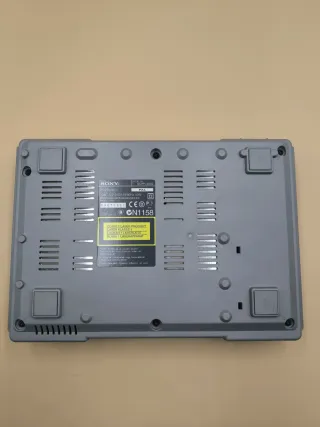 Console PlayStation 1 con accessori