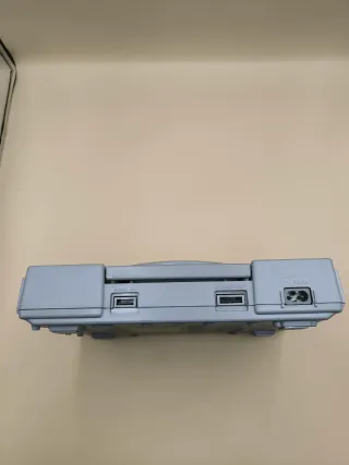 Console PlayStation 1 con accessori
