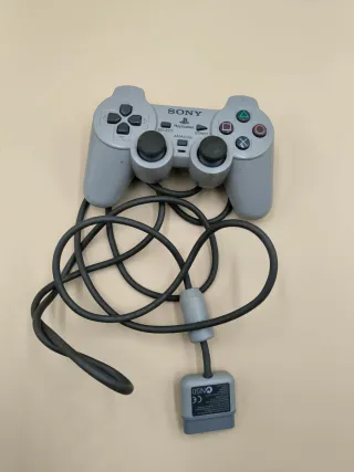 Console PlayStation 1 con accessori