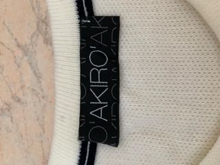 Maglione girocollo bianco con dettagli scozzese