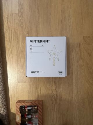 Adorno estrella navideña metal dorado