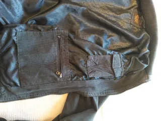 Chaqueta bomber gris con rayas