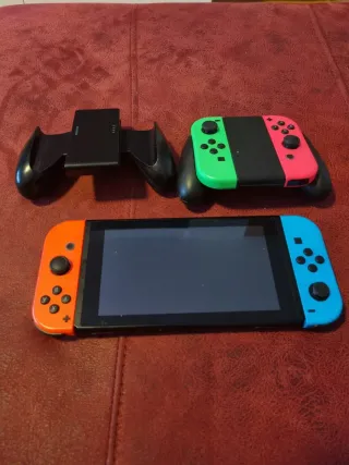 Nintendo Switch + 4 Joy-Con + Dock