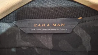 Cazadora bomber gris y negra