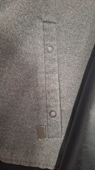 Cazadora bomber gris y negra