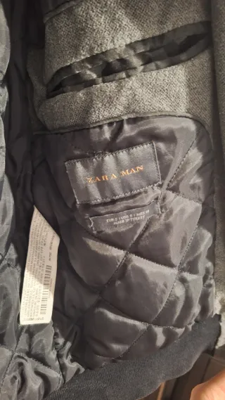 Cazadora bomber gris y negra