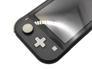 CONSOLA NINTENDO SWITCH LITE GRIS + CARGADOR