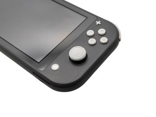 CONSOLA NINTENDO SWITCH LITE GRIS + CARGADOR
