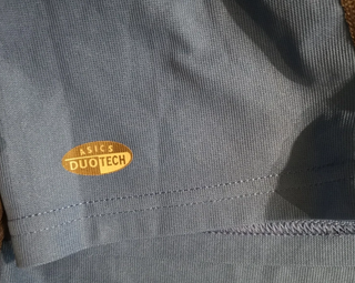 Camiseta running Asics media cremallera