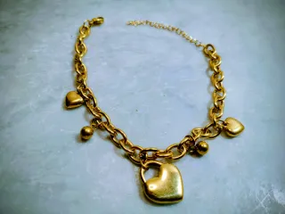 Collana e bracciale in acciaio inox con cuori