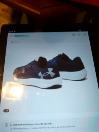 Zapatillas running Under Armour azul marino.