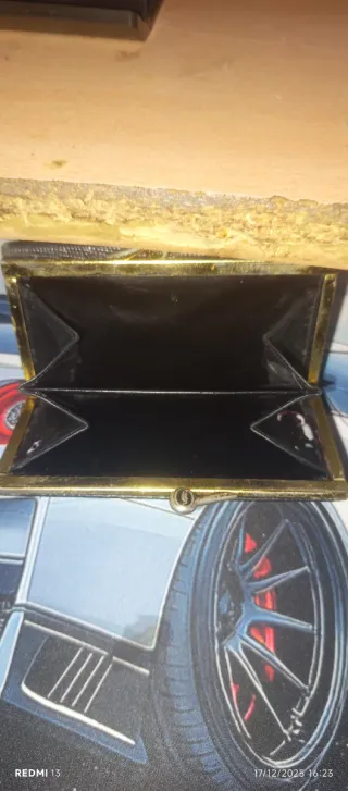 Cartera de piel negra mujer