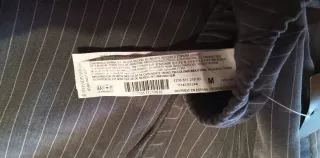 Pantalón gris de vestir con caída