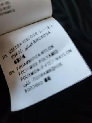 Vestido negro Benetton manga tres cuartos.