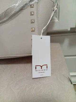 Bolso beige de la marca Milano