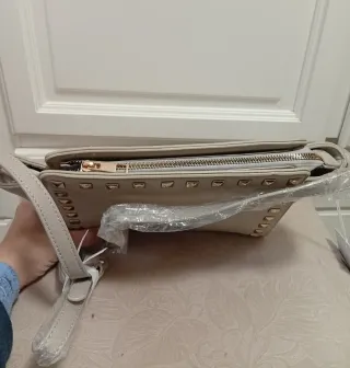 Bolso beige de la marca Milano