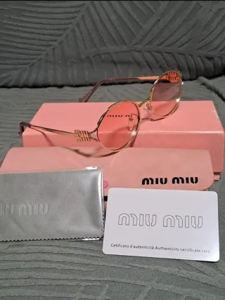 Gafas de sol Miu Miu doradas y rosas