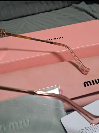 Gafas de sol Miu Miu doradas y rosas