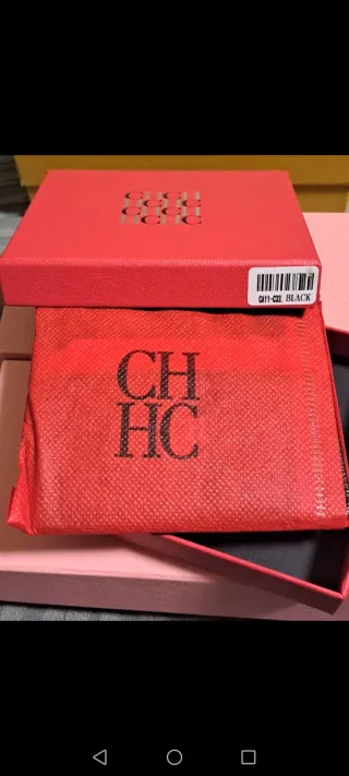 Cartera Carolina Herrera CH Negra y Dorada