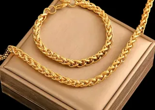 Parure collana e bracciale acciaio dorato