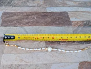 Pulsera perlas semi-barroca y estrella dorada