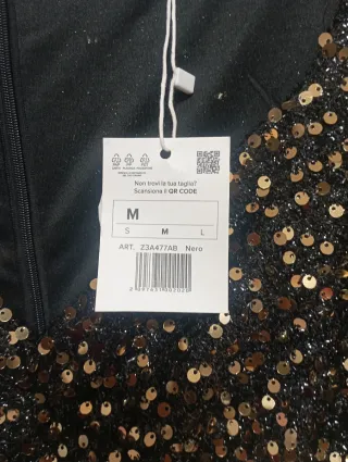 Vestido fiesta lentejuelas negro y dorado